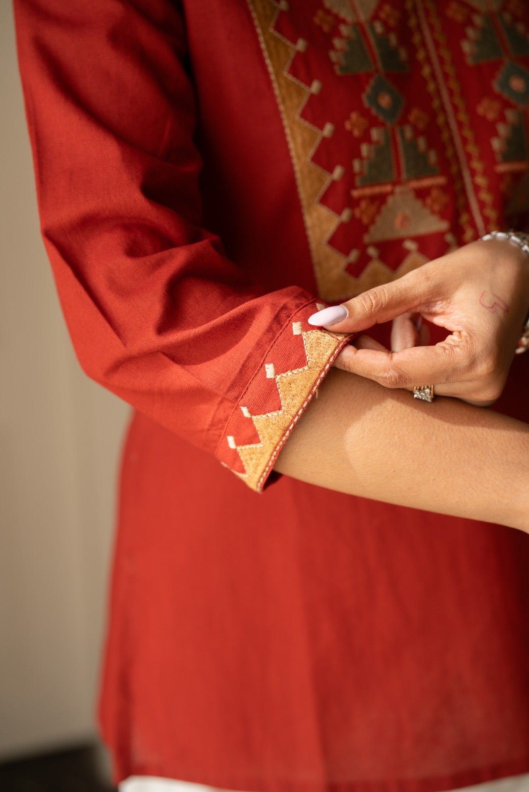 Lizi Embroidered Short Kurti- Rust