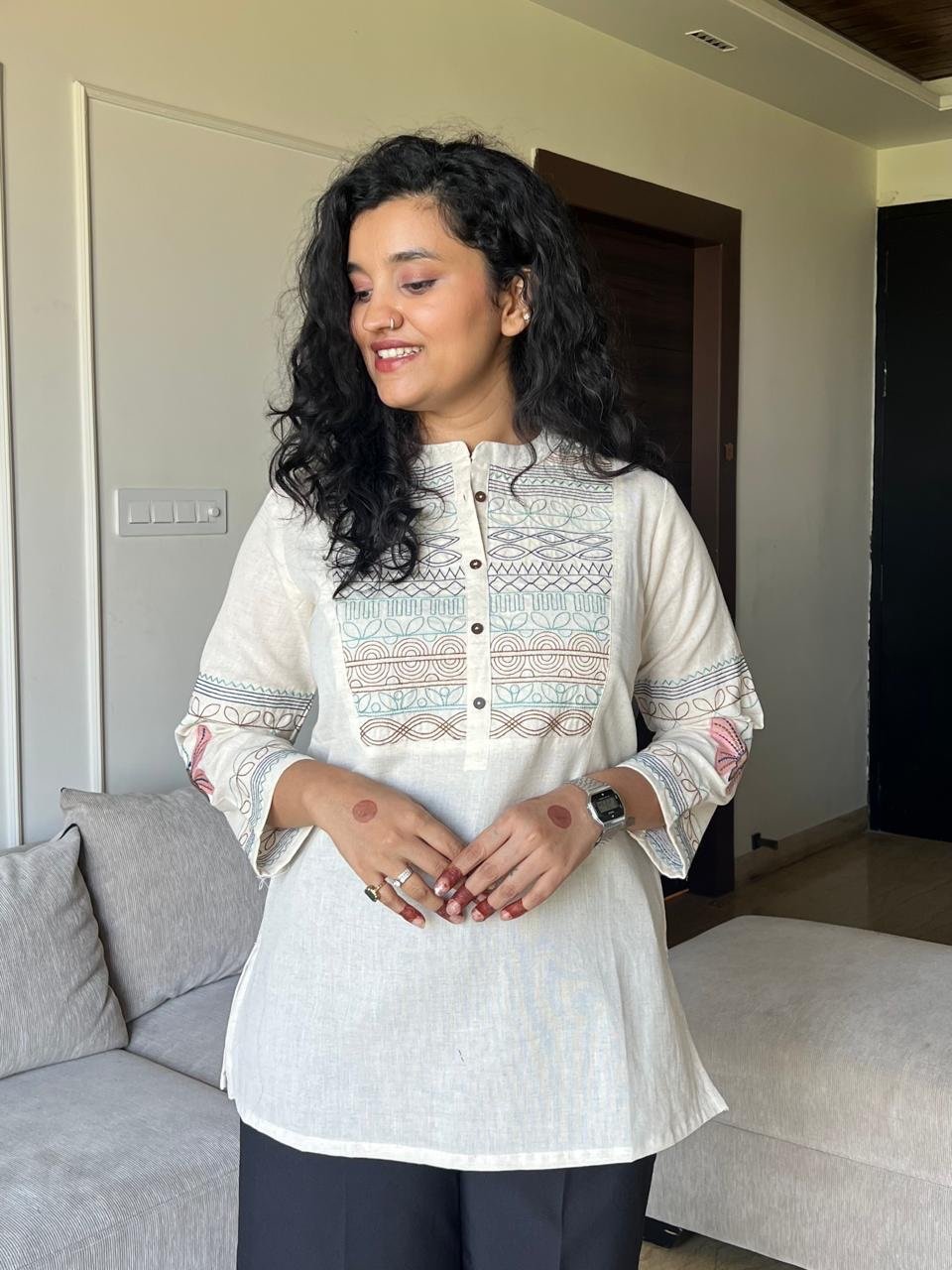 Netra Embroidered Closed Neck Top- Off White